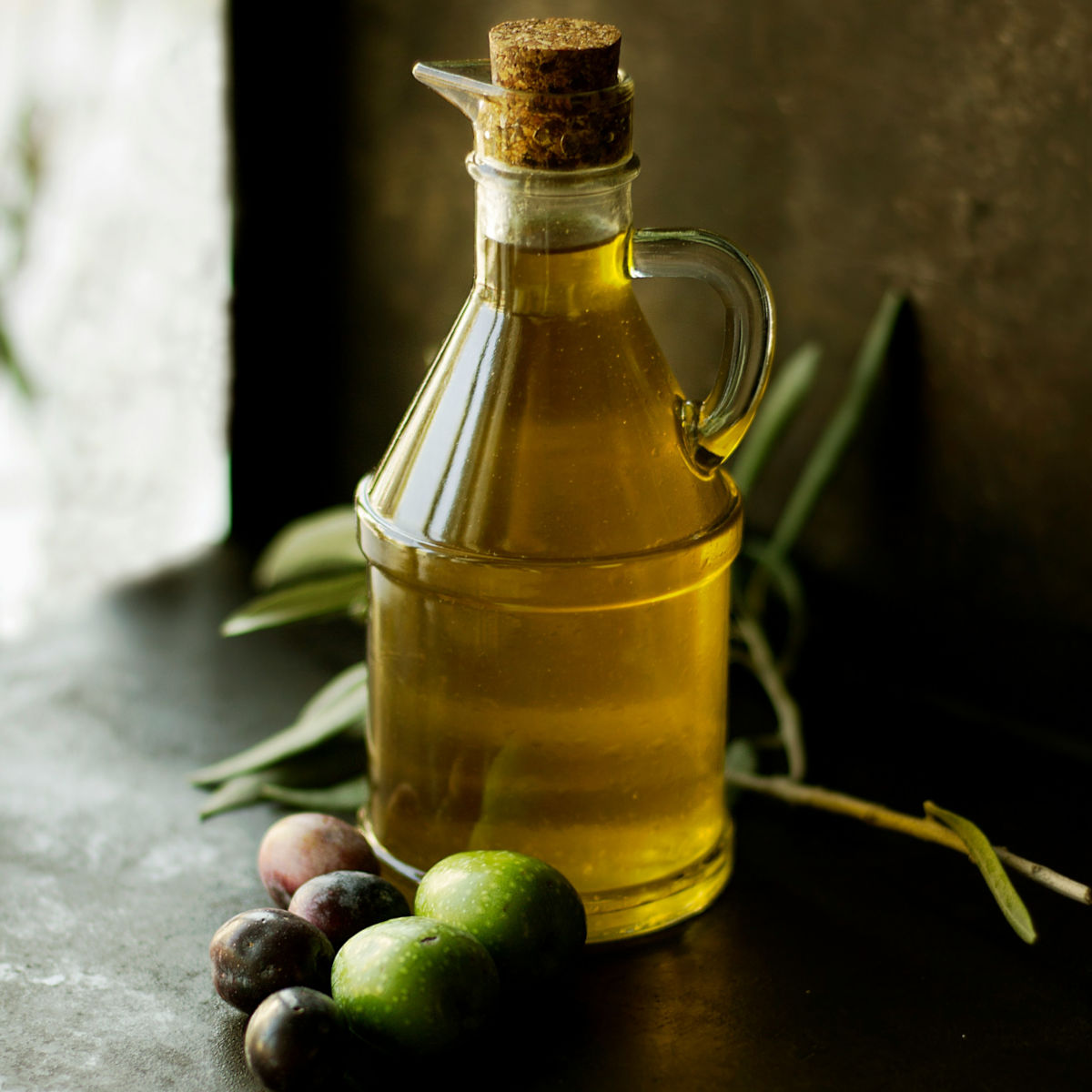 Glasflaska är en variant för att sälja olivolja med klassen eller laget